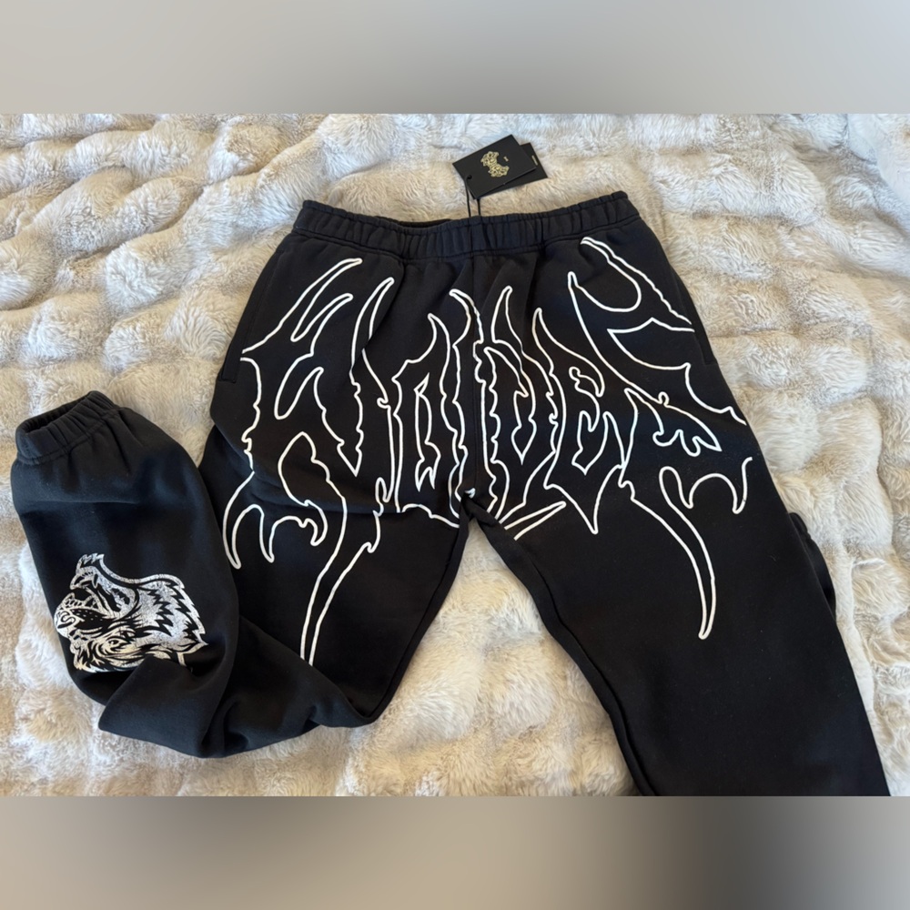 Black Sweatpants with White Graphic Design
